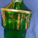 Green glass bottle and Louis style gilding
