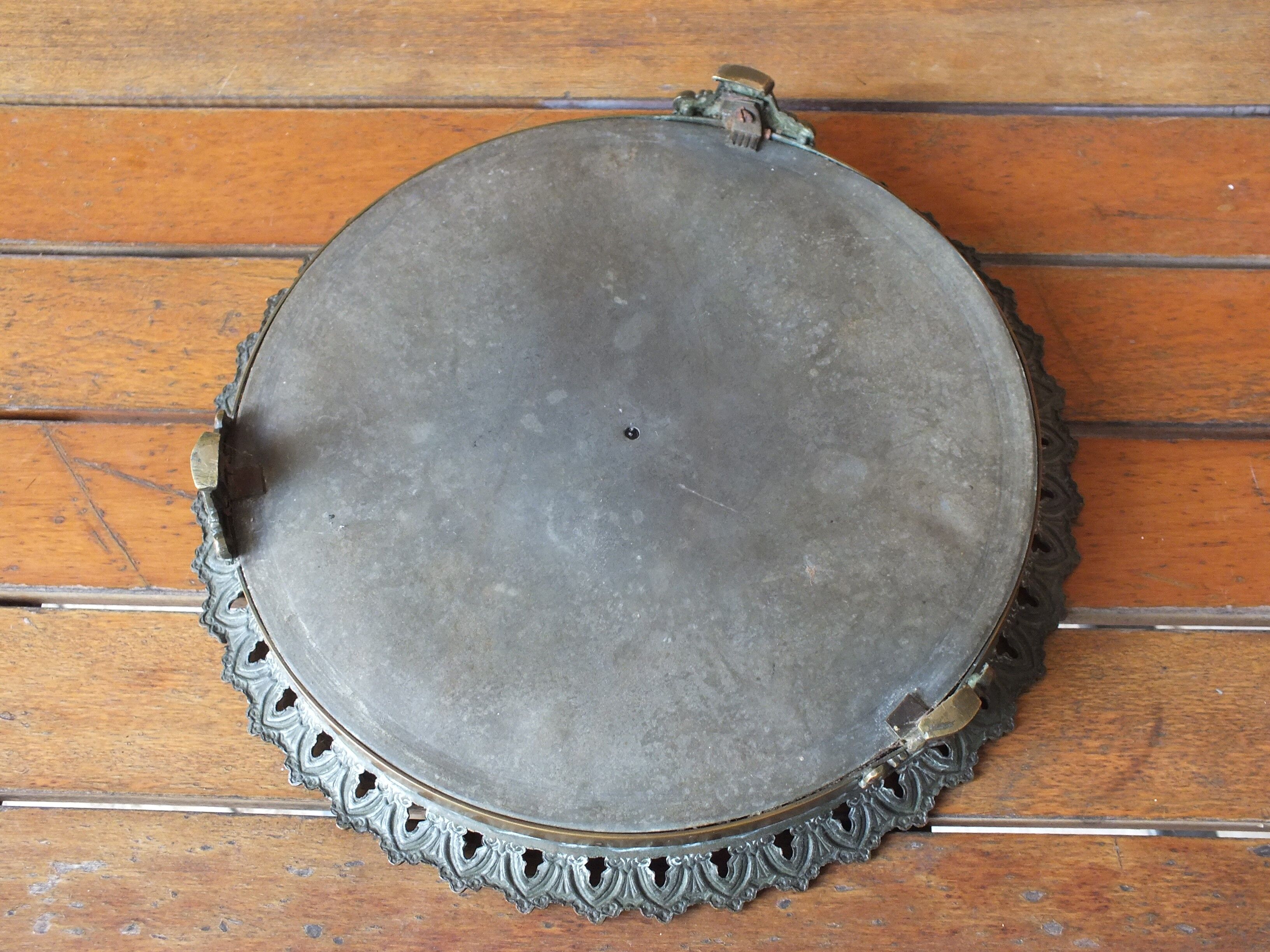 Antique mirror glass centerpiece in bronze and mirror glass