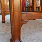 Extendable Art Nouveau table in carved walnut, circa 1900