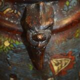 Asian vases in partitioned bronze