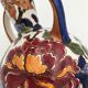 Gien's earthenware vase and two cups, "Peonies" decoration, signed GIEN - 20th century