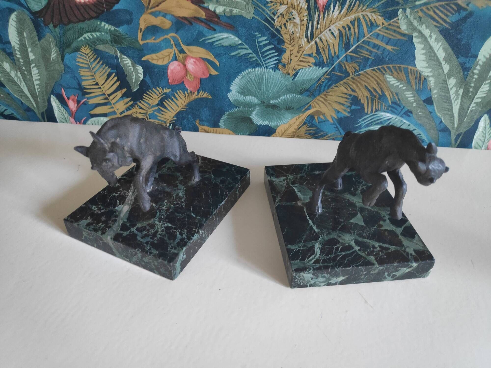 old ibex bookend, base in beautiful black marble veined green