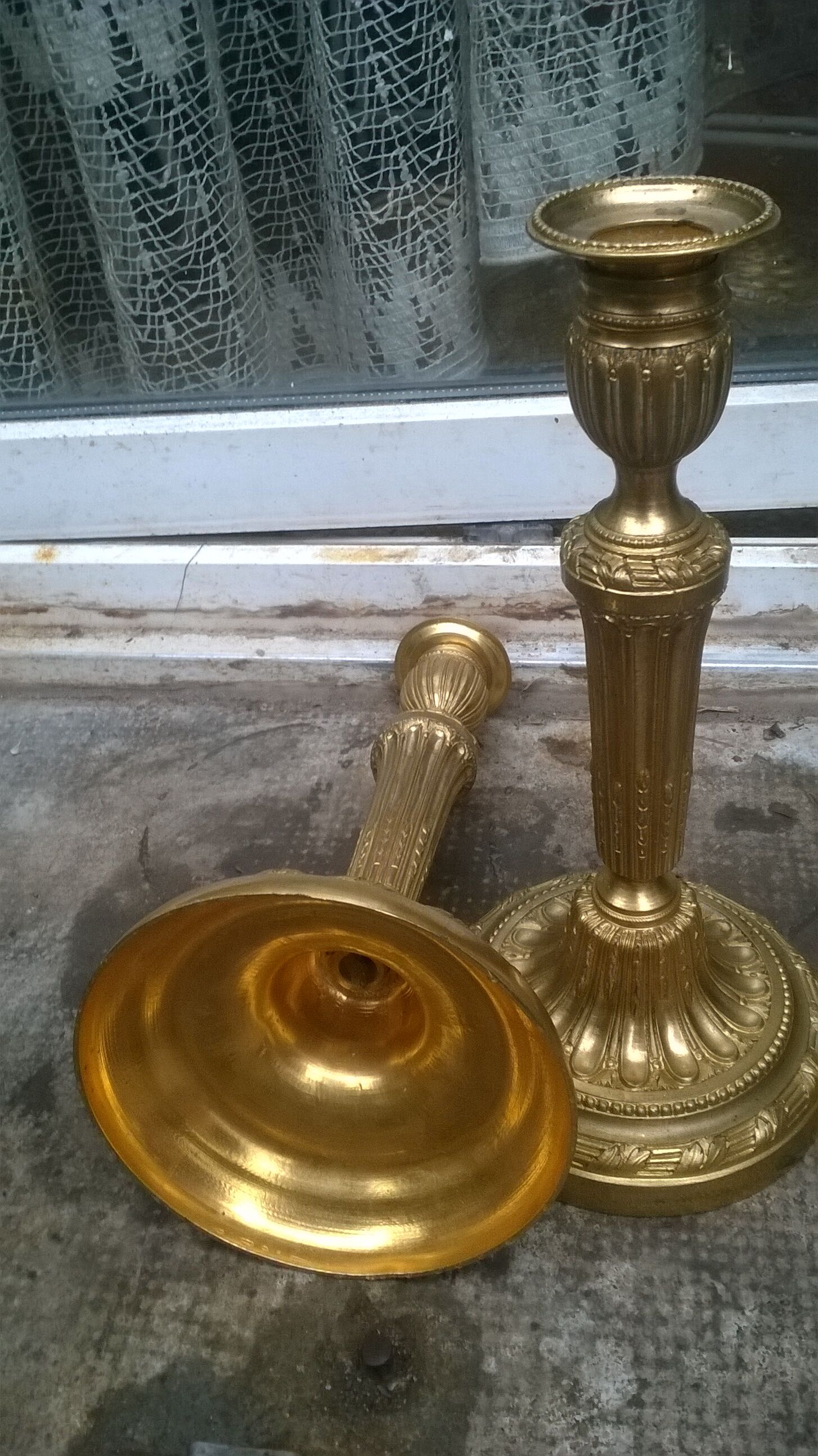 Pair of golden bronze candlesticks