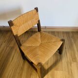 Pair of low wooden and straw armchairs
