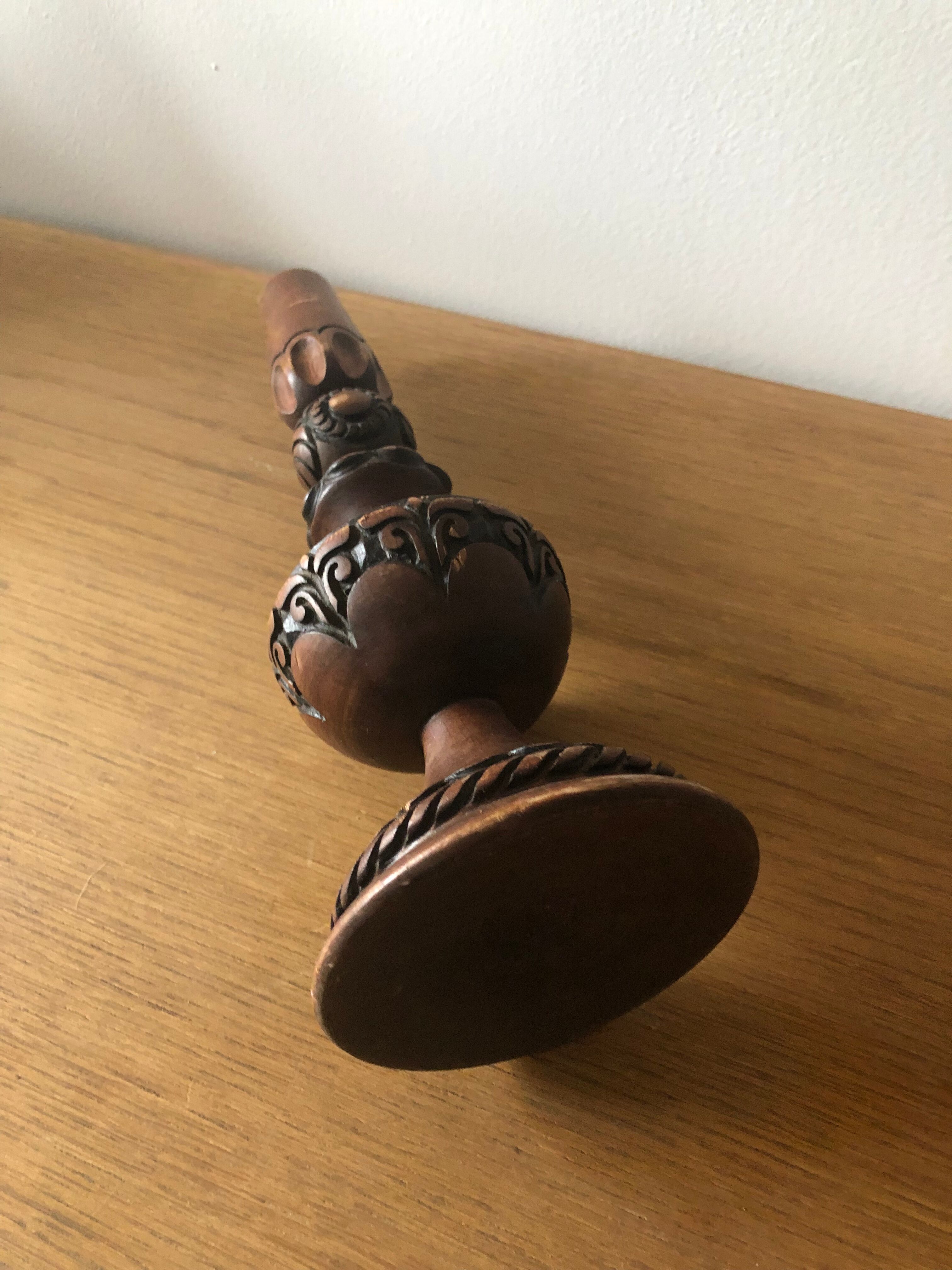 Carved wooden candle holder