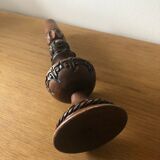 Carved wooden candle holder