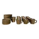 Set of stoneware coffee cups with saucers.