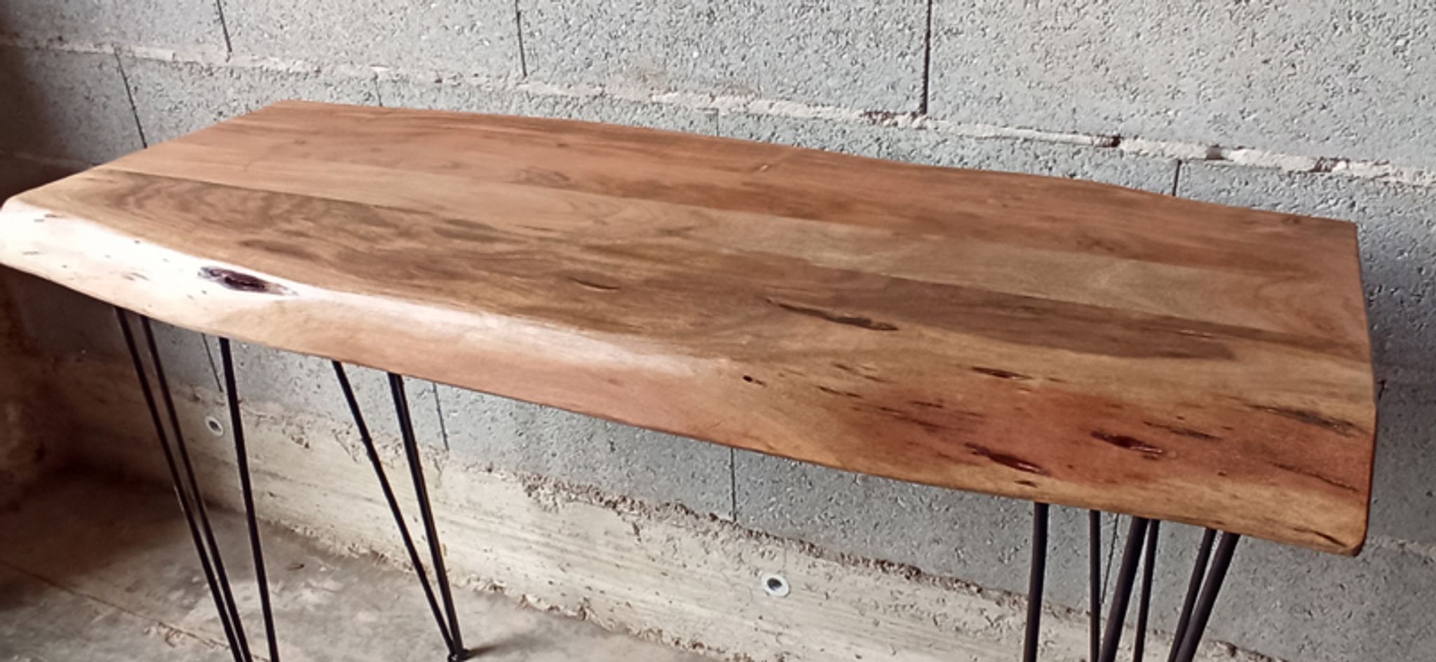 Wooden console with metal feet