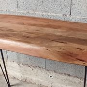 Wooden console with metal feet