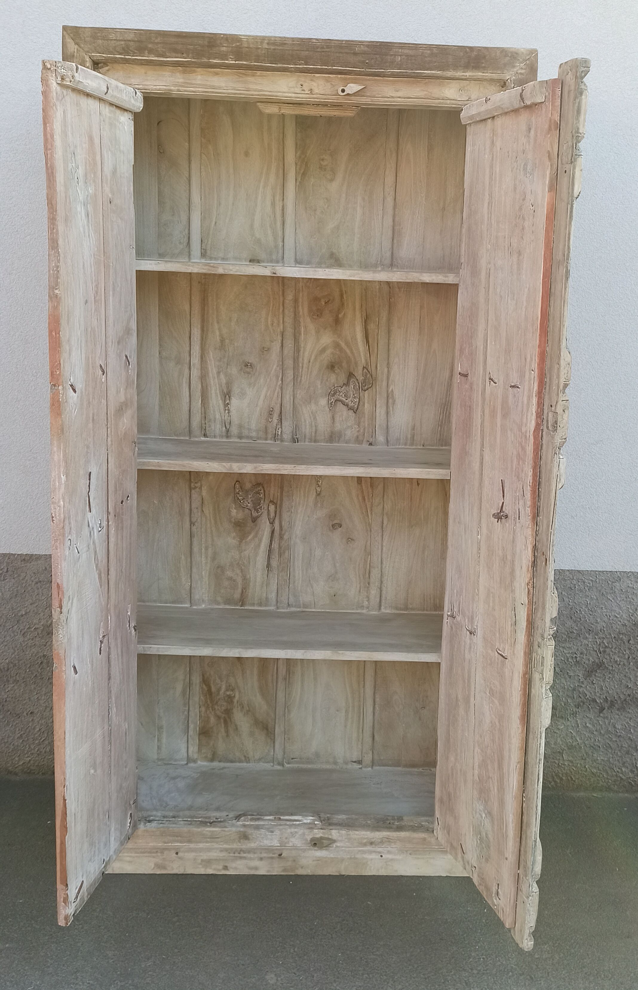 Wooden wardrobe with antique doors