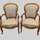 Paire de fauteuils de style Louis Philippe en hêtre teinté XX siècle