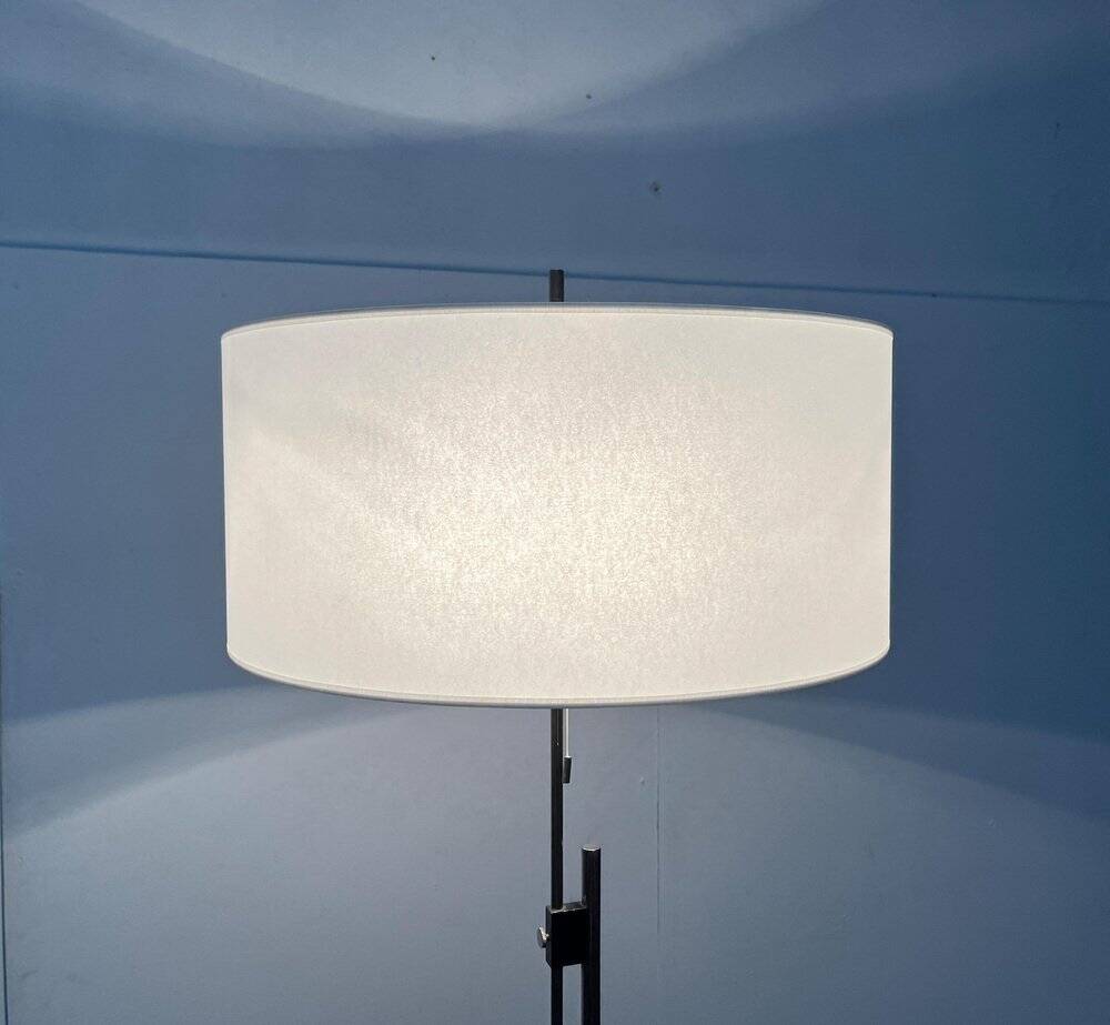 Mid-century German minimalist tripod floor lamp from the 1960s.