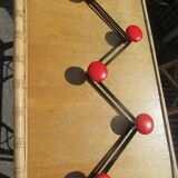 vintage black and red iron coat rack
