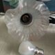 Tulip lamp in patinated black metal with an opaque glass shade.