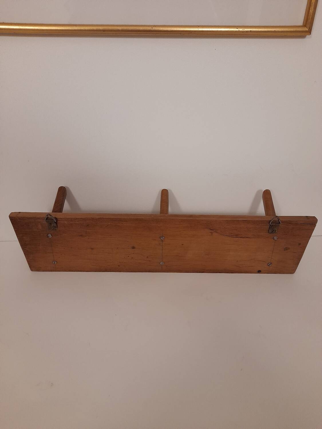 Pretty trapezoidal coat hook from the 60s