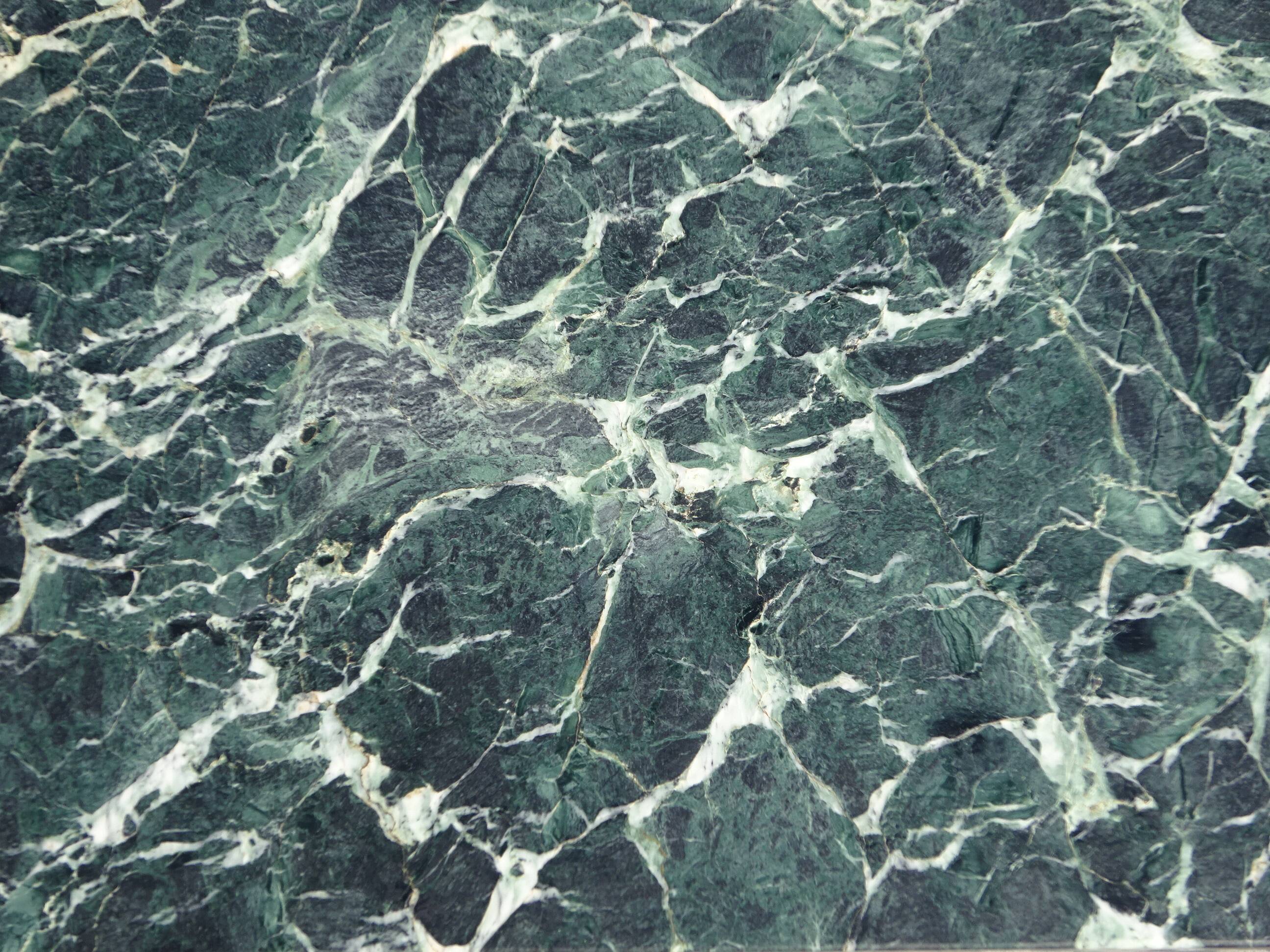 Flamed mahogany enfilade with sea green marble in Empire style.