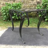 Vintage ceramic coffee table by Guy Trévoux with wrought iron base.