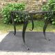 Vintage ceramic coffee table by Guy Trévoux with wrought iron base.