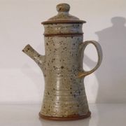 Teapot or stoneware coffee pot by Gustave Tiffoche.