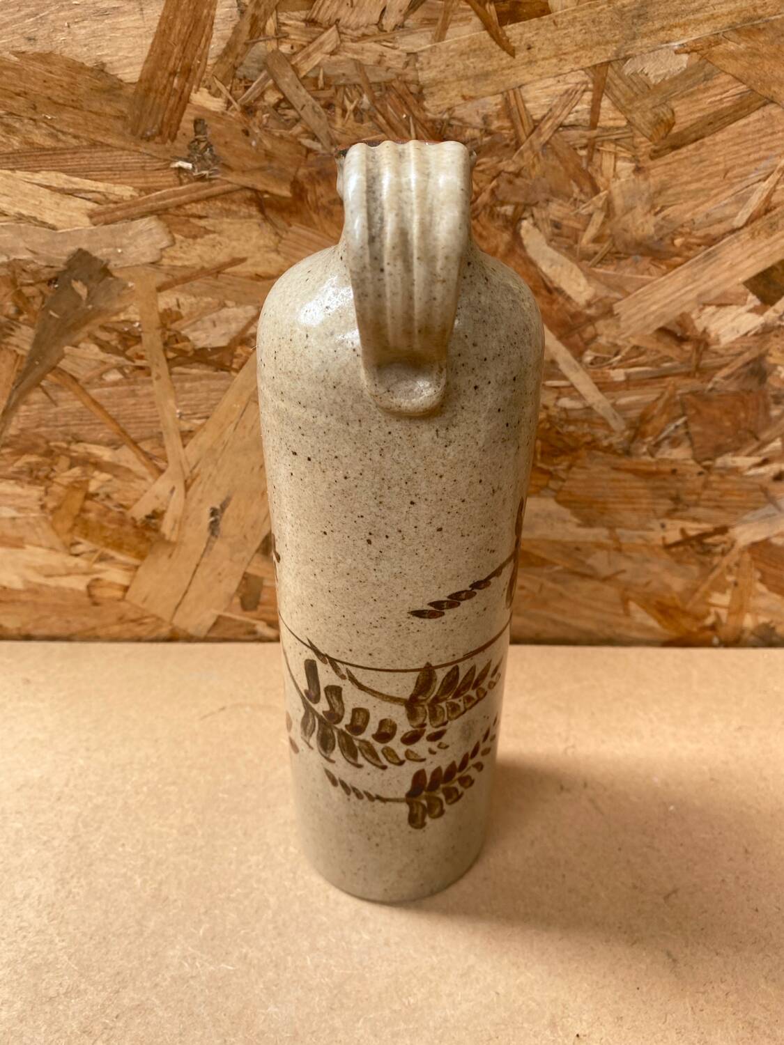 Antique beige enameled ceramic bottle vintage leaf decor