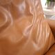 Vintage COR Swing armchair with ottoman, Reinhold Adolf, cognac leather