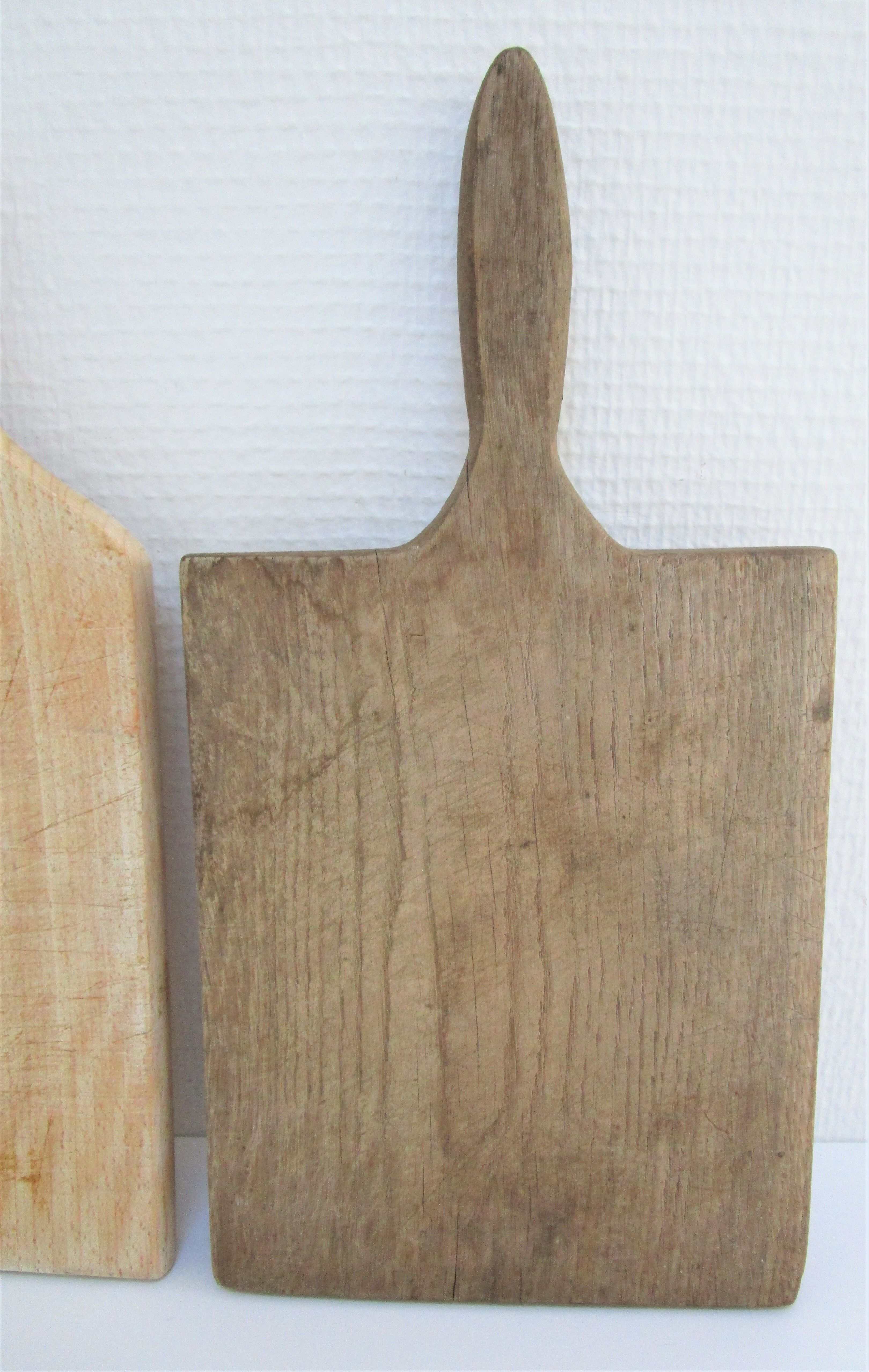 Two vintage solid wood cutting boards