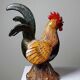 Small decorative rooster in handcrafted enameled ceramic folk art