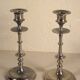 Pair of candlesticks in silver metal