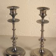 Pair of candlesticks in silver metal