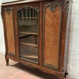Louis XV style bookcase in mahogany and burr walnut, 20th century