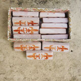 12 ancient fleur de lys knife holders in terracotta