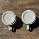 Pair of mugs with stylized Italian women motifs