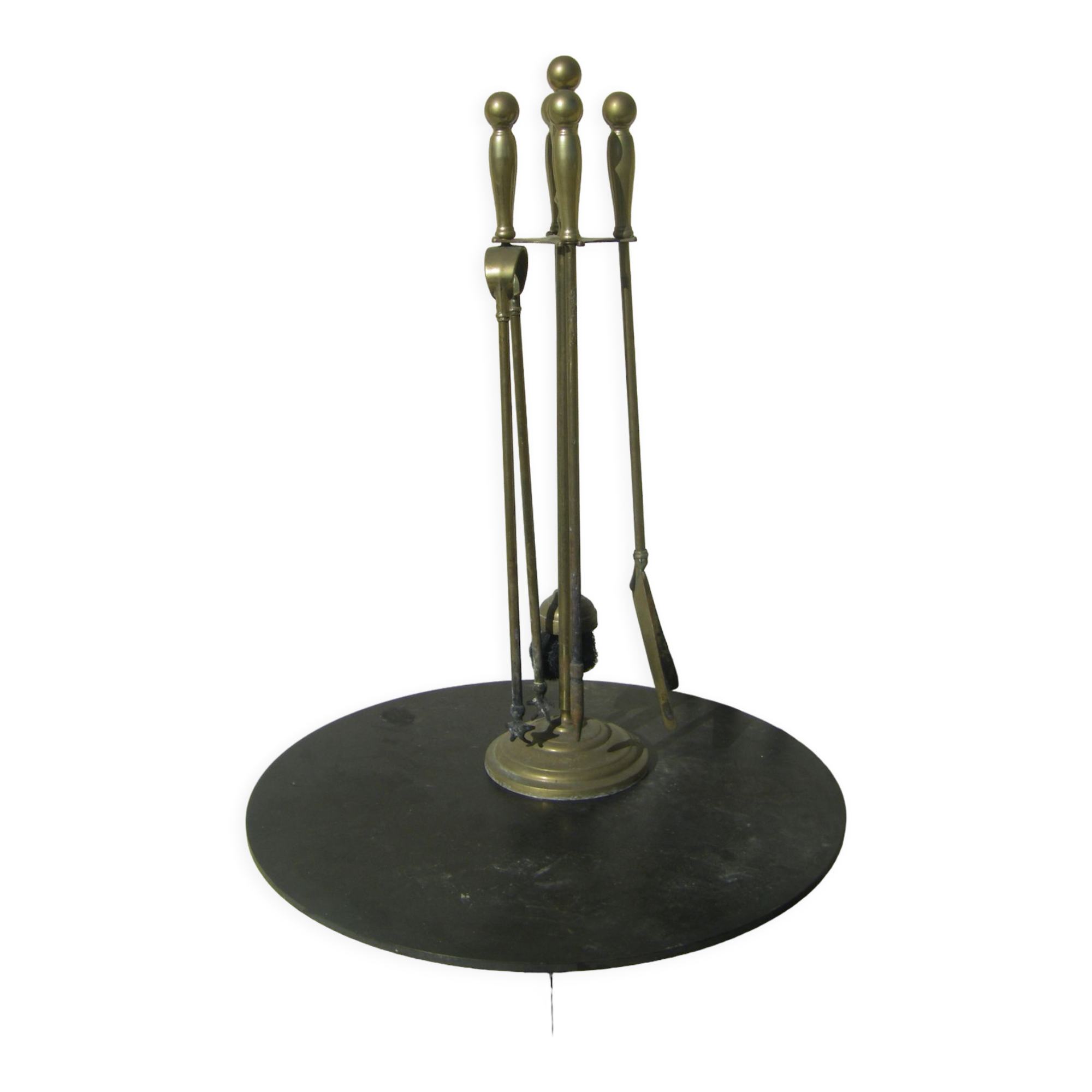 Gilded brass fireplace servant.