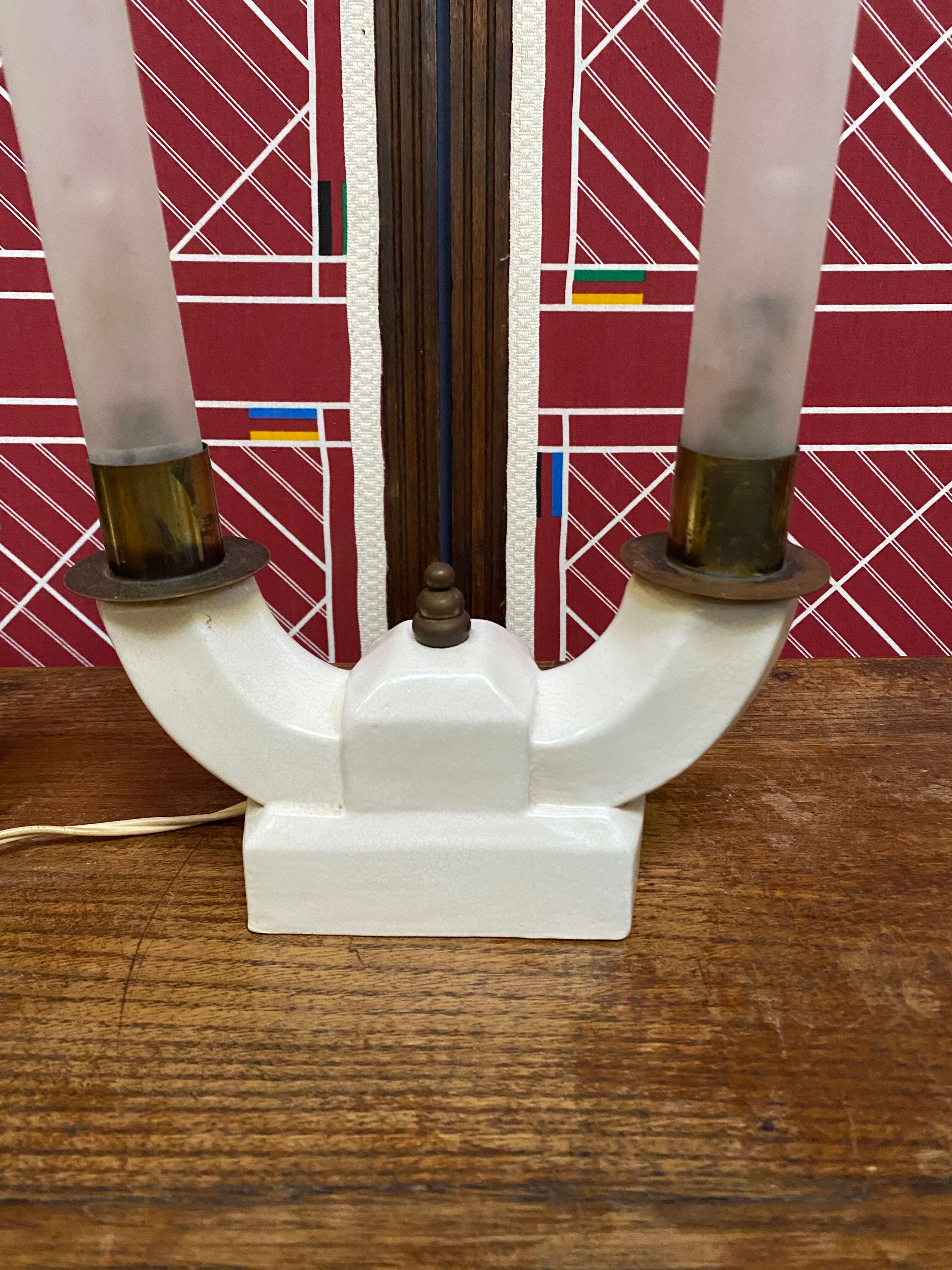 Pair of ceramic and brass office chandeliers