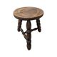 Rustic three-legged oak stool