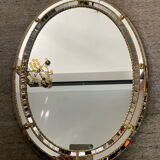 Vintage mirror in solid wood with brass and parcloses.