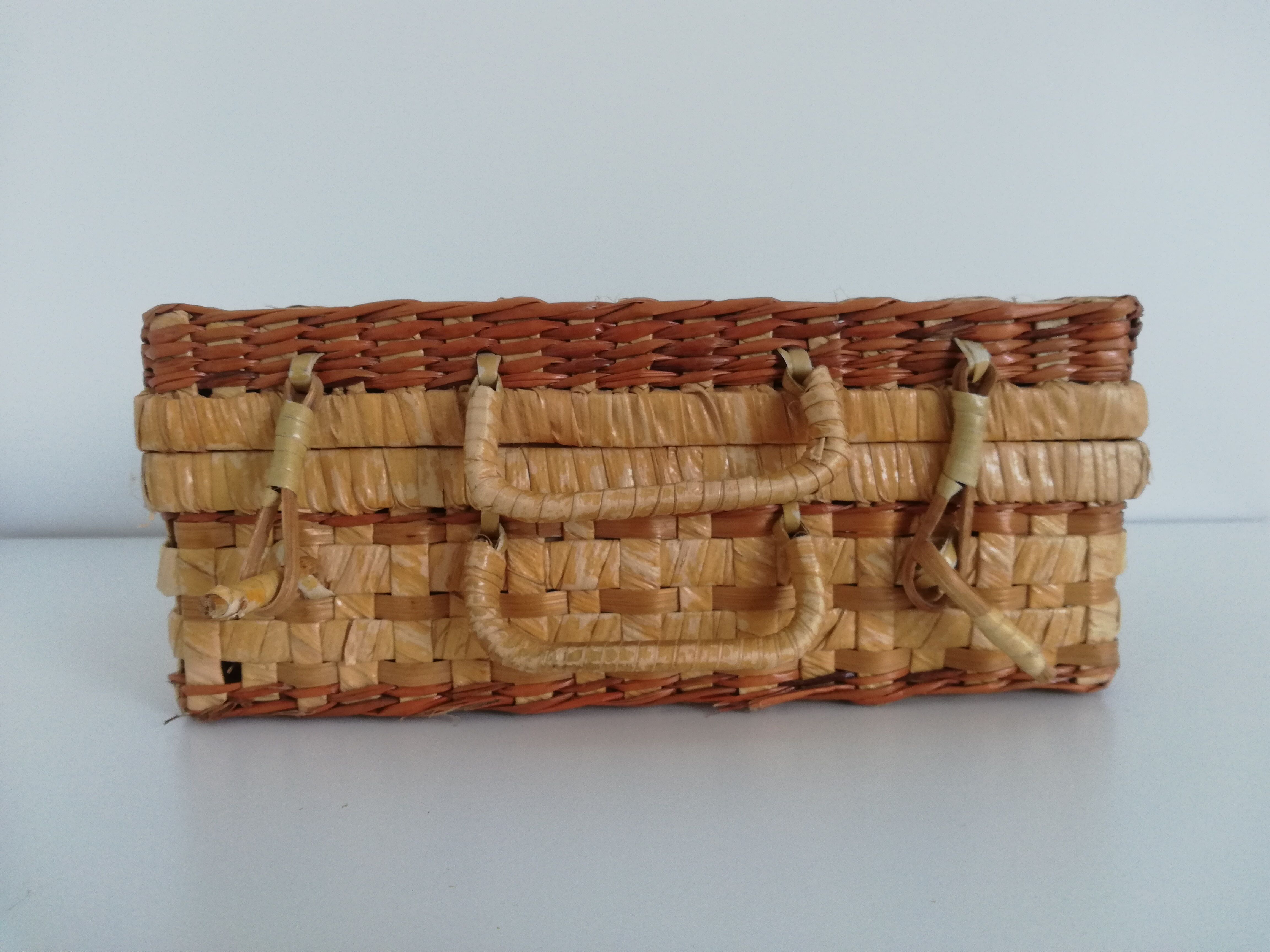 Vintage wicker suitcase