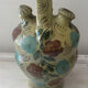 Mediterranean ceramic jug with floral decoration.