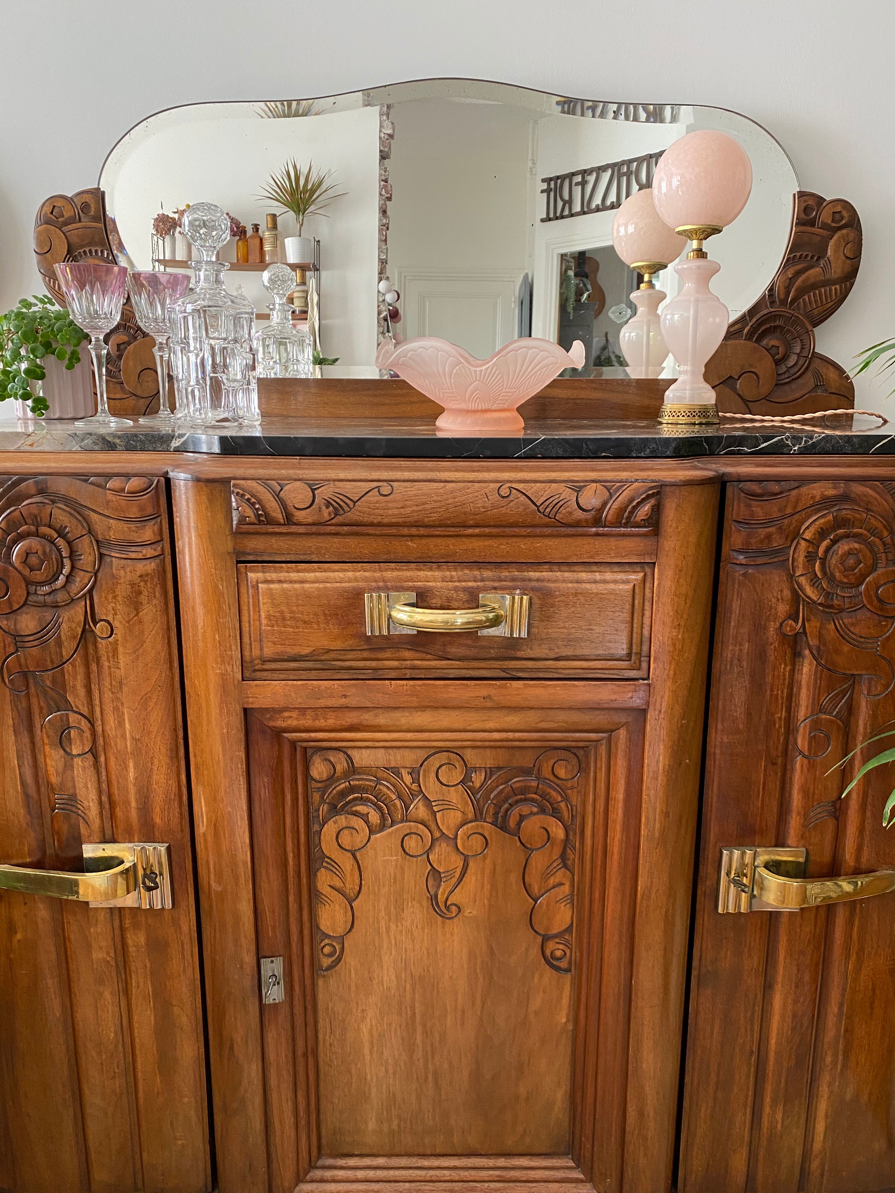 Art Deco black marble sideboard and vintage beveled mirror
