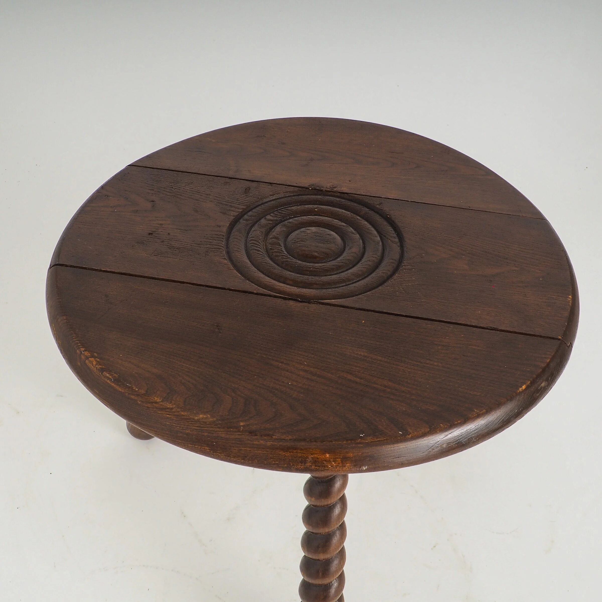French oak tripod side table attributed to Charles Dudouyt