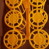 Vintage yellow plastic bottle holder