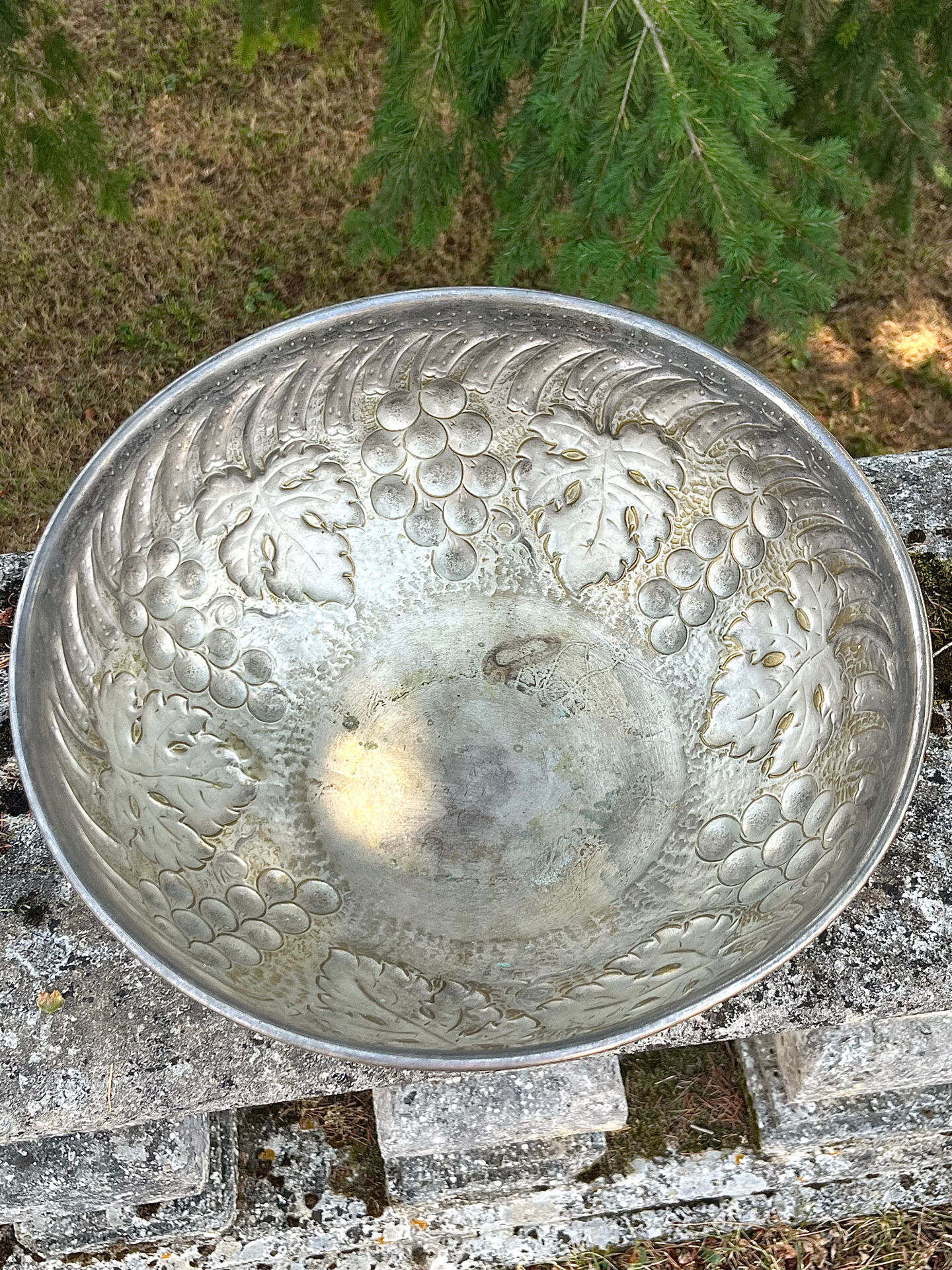 Large silver plated champagne cooler bowl on pedestal with grape
