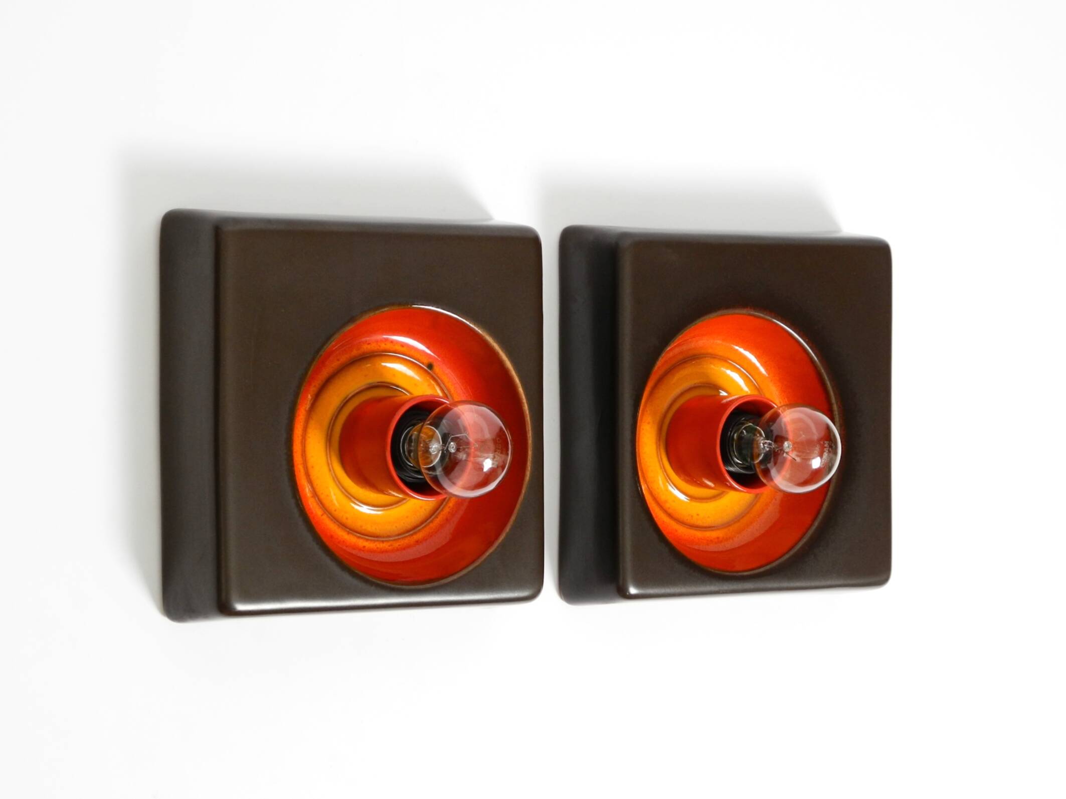 Two beautiful original 1970s Space Age ceramic wall lamps