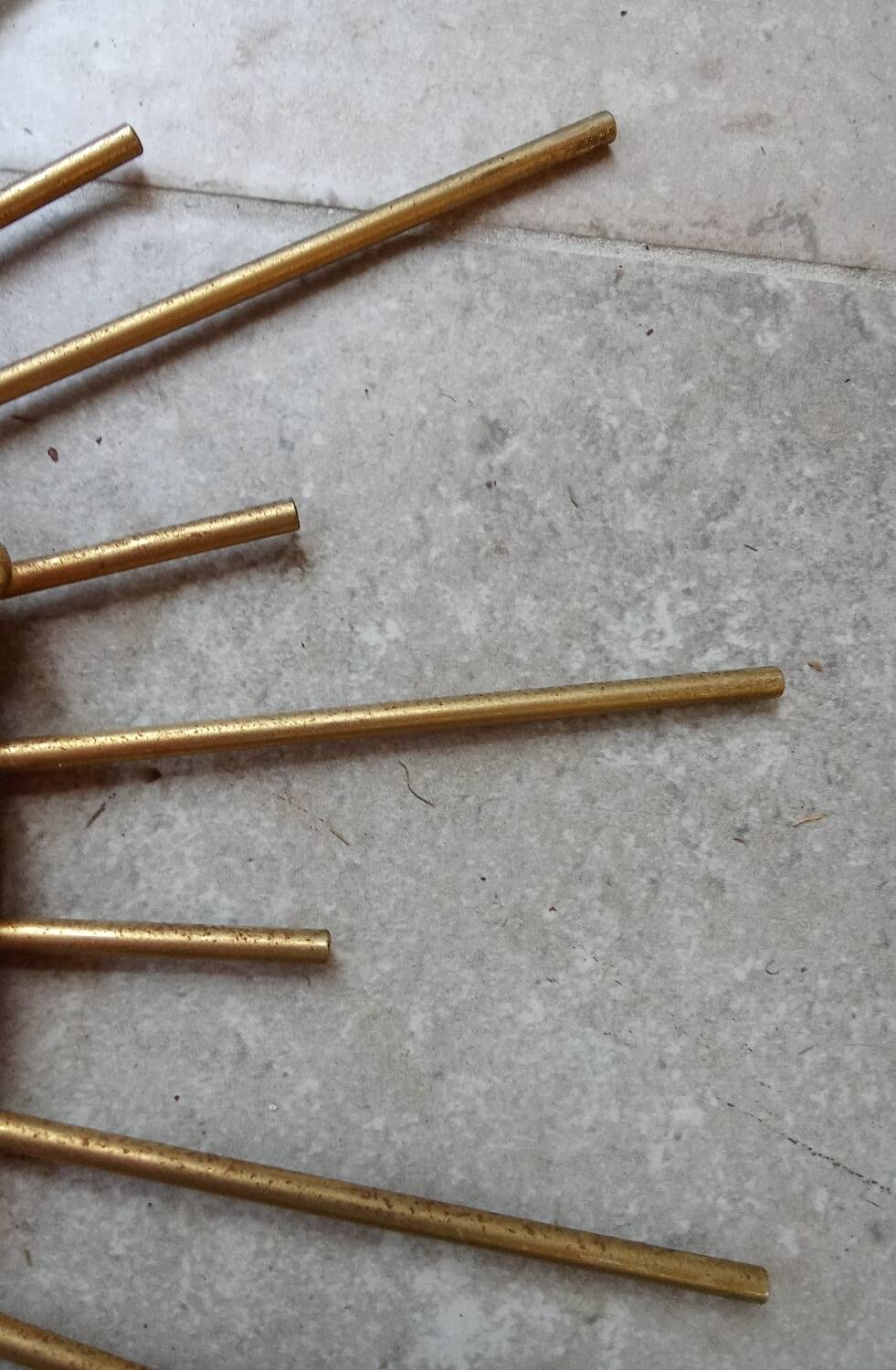 Miroir soleil métal doré