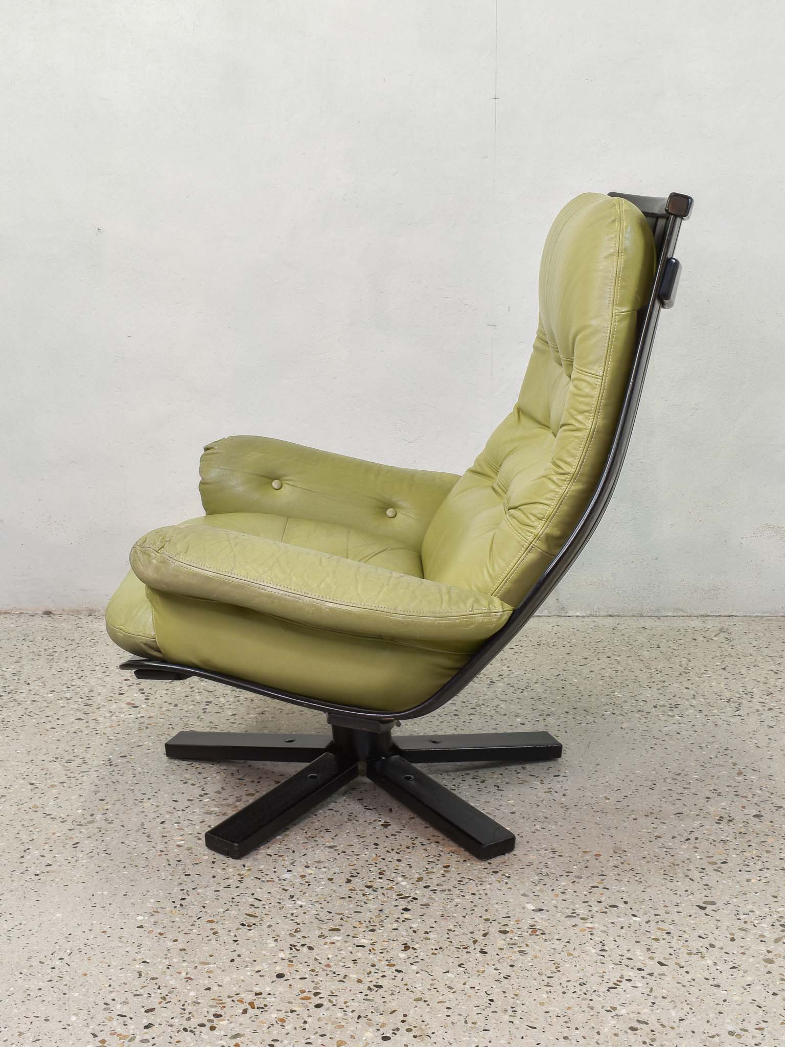 Leather swivel armchair