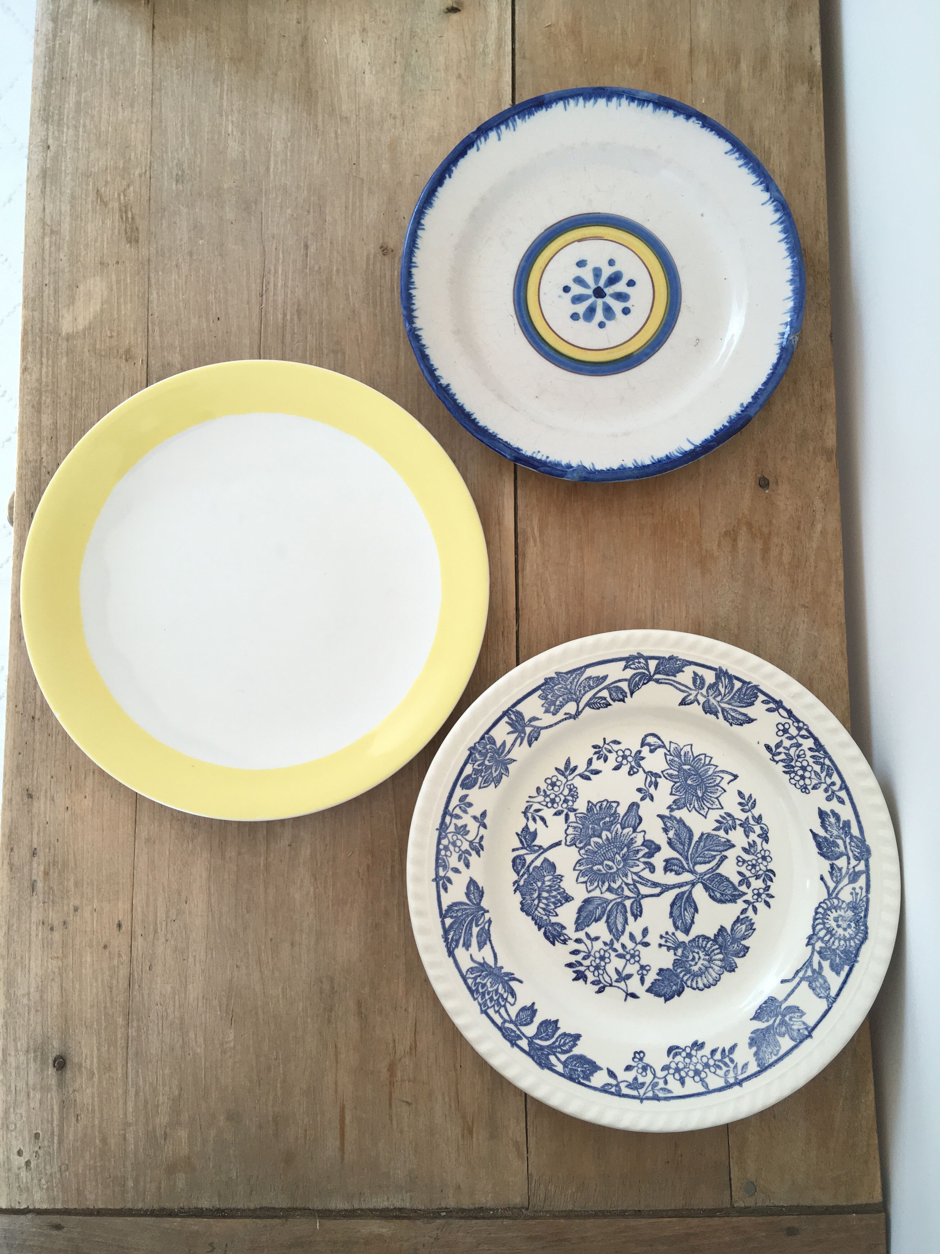 Mismatched yellow & blue plates