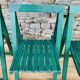 Set of 4 green folding chairs
