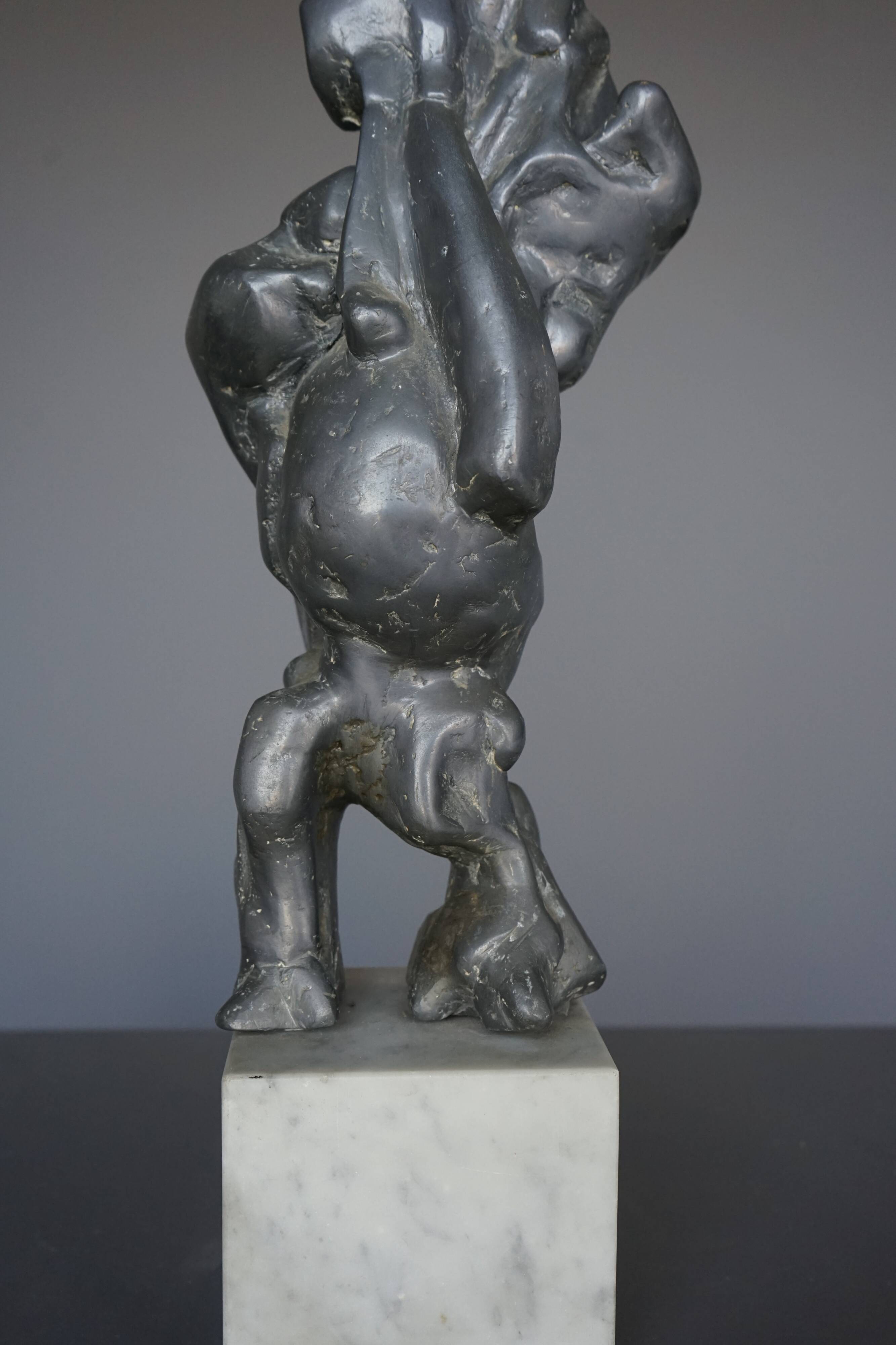 Large abstract lead Sculpture on a marble base. 1960s