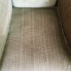 Fringed velvet armchair
