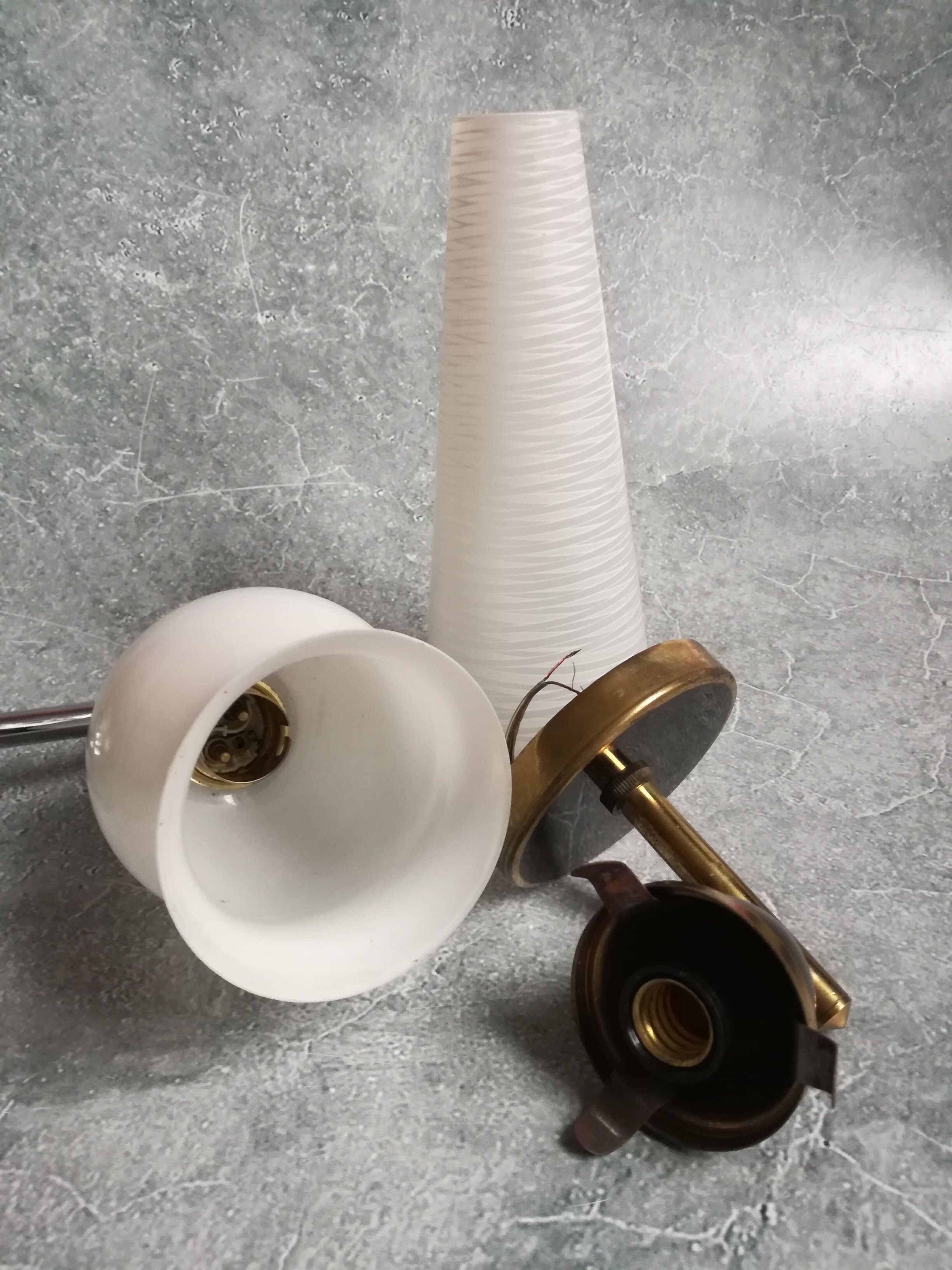 Mismatched sconces 1950